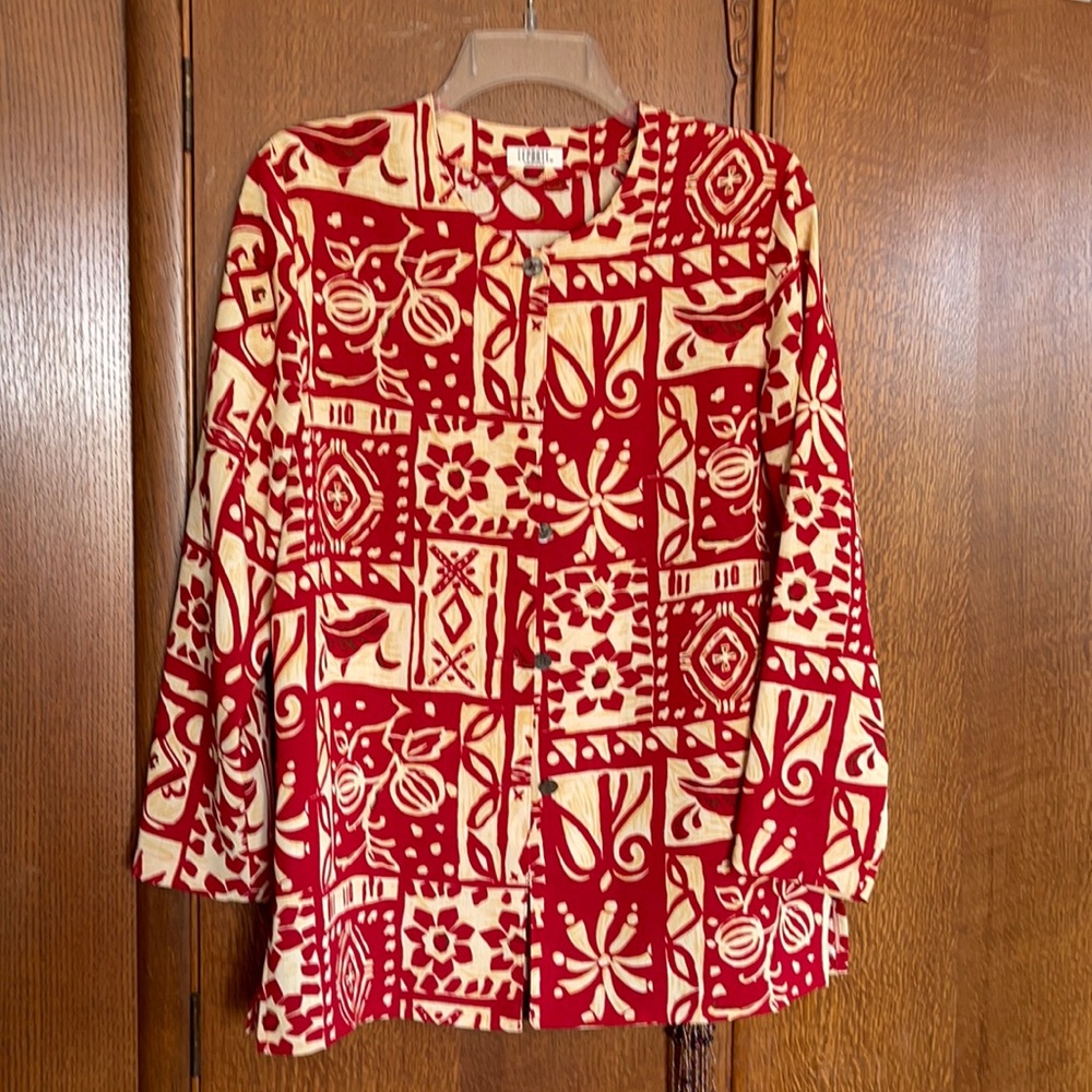 LePorte Tokyo Style deconstructed blouse with side vents.